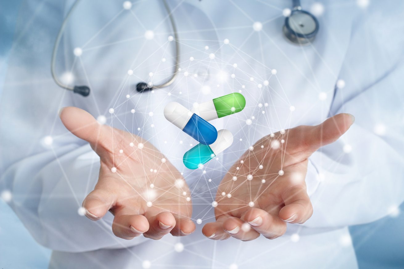 Pills in the doctor's hands . Pills in the doctor's hands on blurred background.